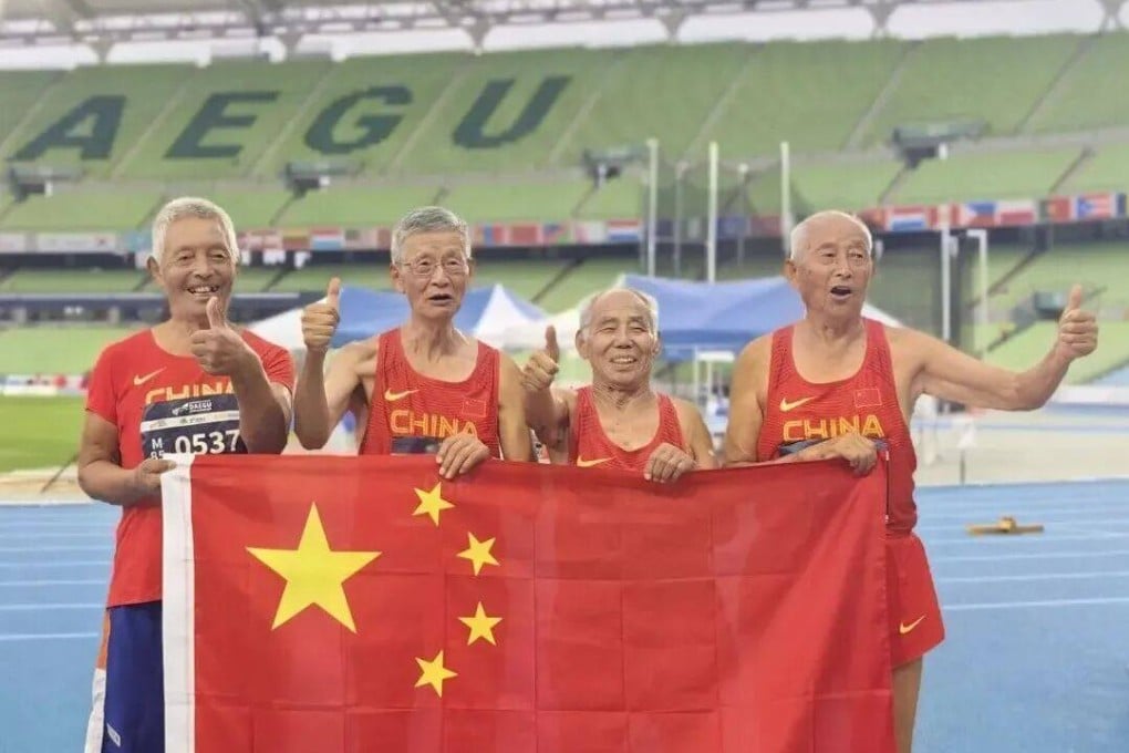 Lyu Mingpu (second from right) and his teammates after winning gold in the men’s M85 4x100m relay. Photo: CCTV