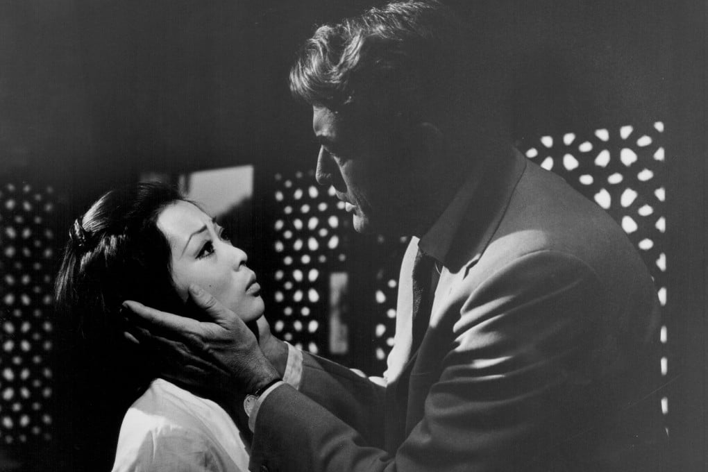 Gregory Peck (right) and Francesca Tu in a scene from The Chairman, alternatively titled The Most Dangerous Man in the World. Photo: Getty Images