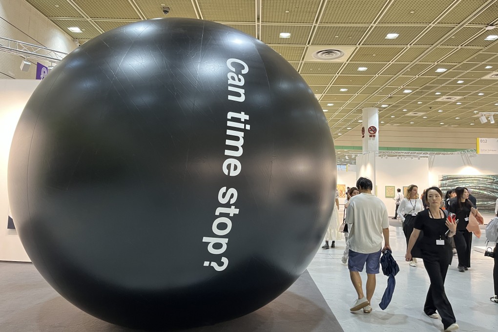 Visitors walk past “Can time stop?” (2025) by British artist Ryan Gander at Frieze Seoul 2026. Photo: Enid Tsui