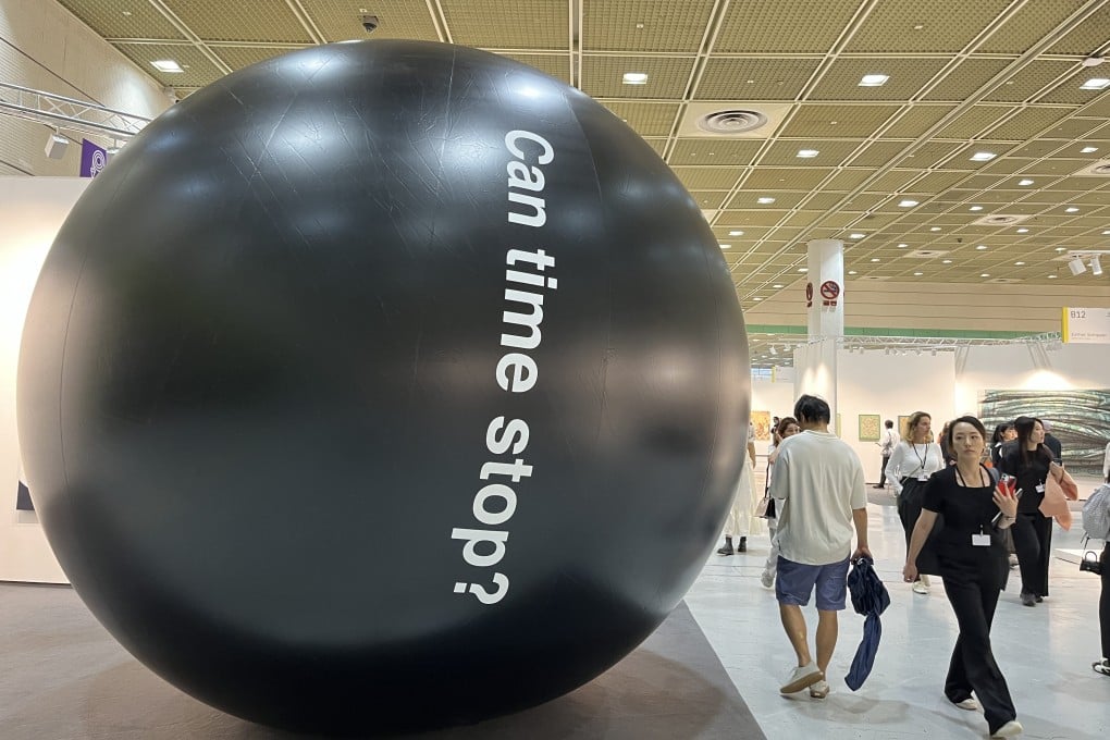 Visitors walk past “Can time stop?” (2025) by British artist Ryan Gander at Frieze Seoul 2026. Photo: Enid Tsui