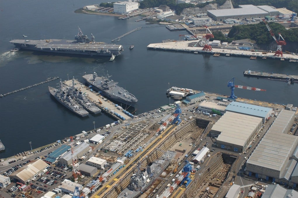 The USS Kitty Hawk backs into pier in Yokosuka, Japan. The ship repair capacity of regional allies in the western Pacific is essential to US naval capabilities. Photo: US Navy