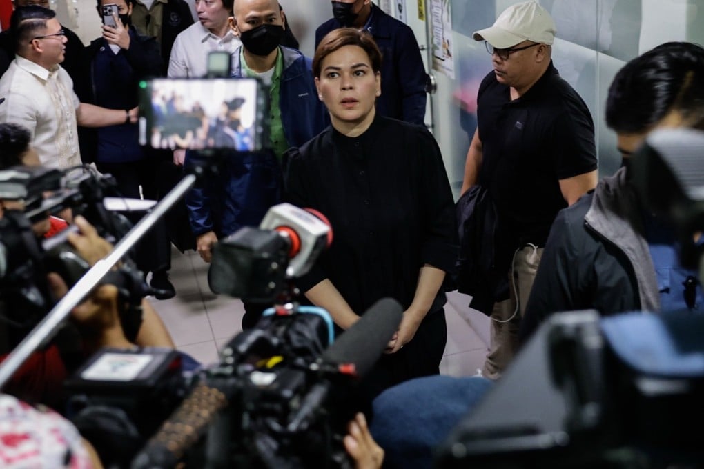 Philippine Vice-President Sara Duterte-Carpio (centre) at the Hall of Justice in Quezon City, Metro Manila on Saturday. Duterte arrived to post bail after a Quezon City court issued an arrest warrant on Friday. Photo: EPA