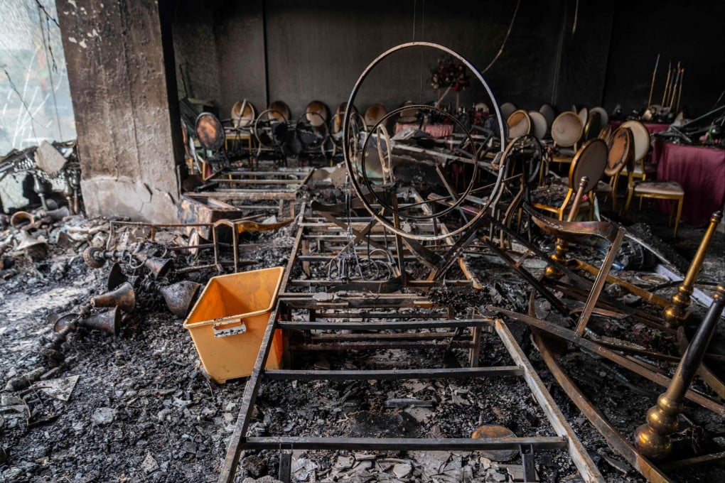 A wedding reception hall damaged by fire in Kinshasa, Democratic Republic of Congo on Saturday. Photo: AFP