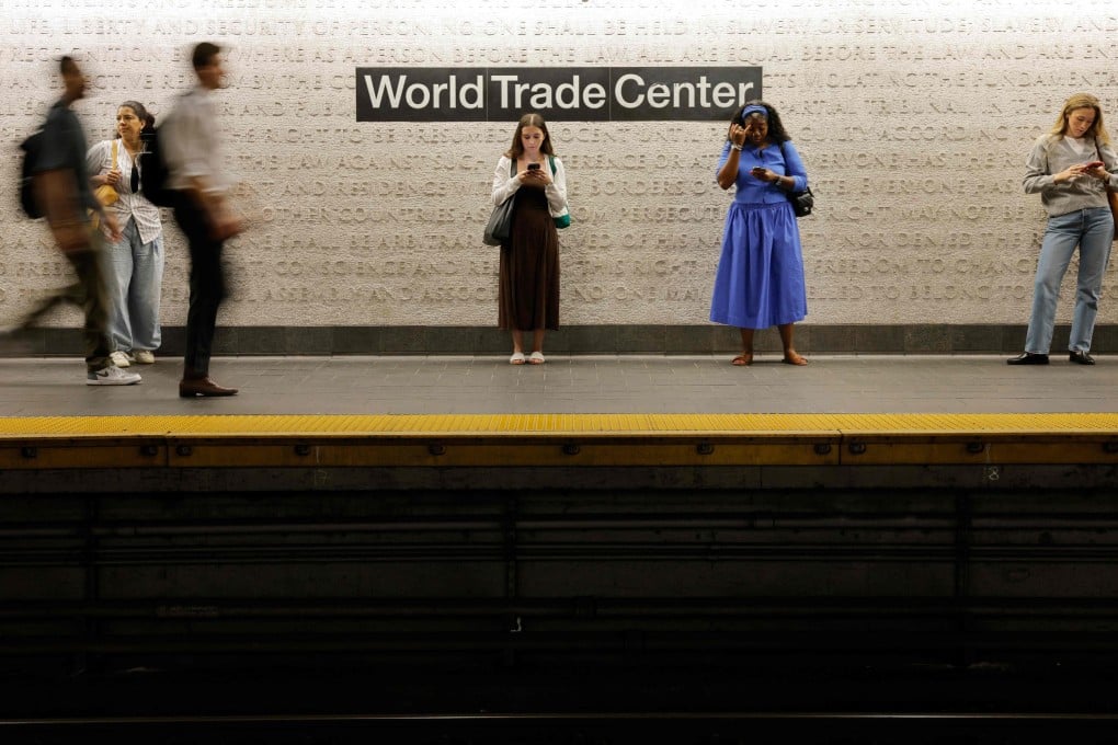Commuters wait at a subway station in New York City last month. Photo: Getty Images via AFP