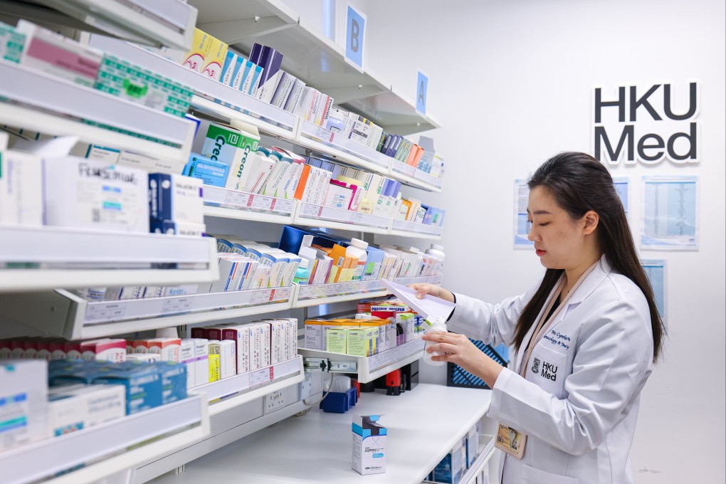 A pharmacist introduces services provided at an HKUMed Community Pharmacy in December 2024. The University of Hong Kong's Faculty of Medicine has revised its language requirements for admission. Photo: Nora Tam