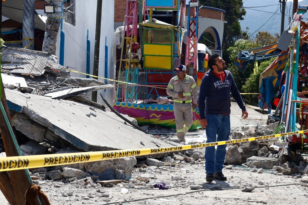 Firefighters inspect the area destroyed by a fireworks explosion at Santa María Canchesda church in Temascalcingo, Mexico on Sunday. Photo: AP
