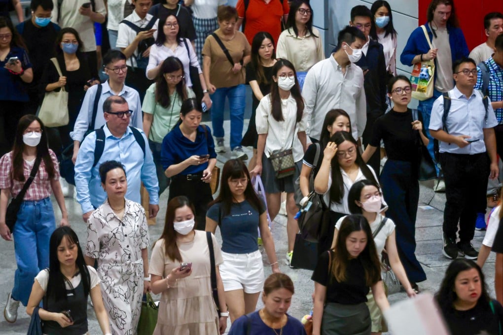 Hongkongers head to work in Central on August 18, 2026. Photo: Jonathan Wong