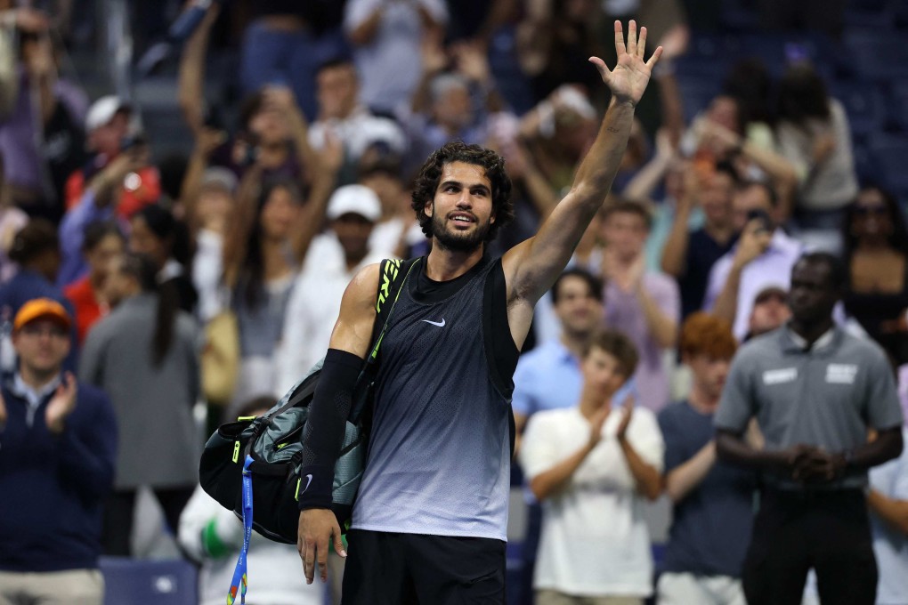 Carlos Alcaraz of Spain waves to the crowd after his loss to Ben Shelton of the US in the quarter-finals of the US Open on Tuesday. Photo: AFP