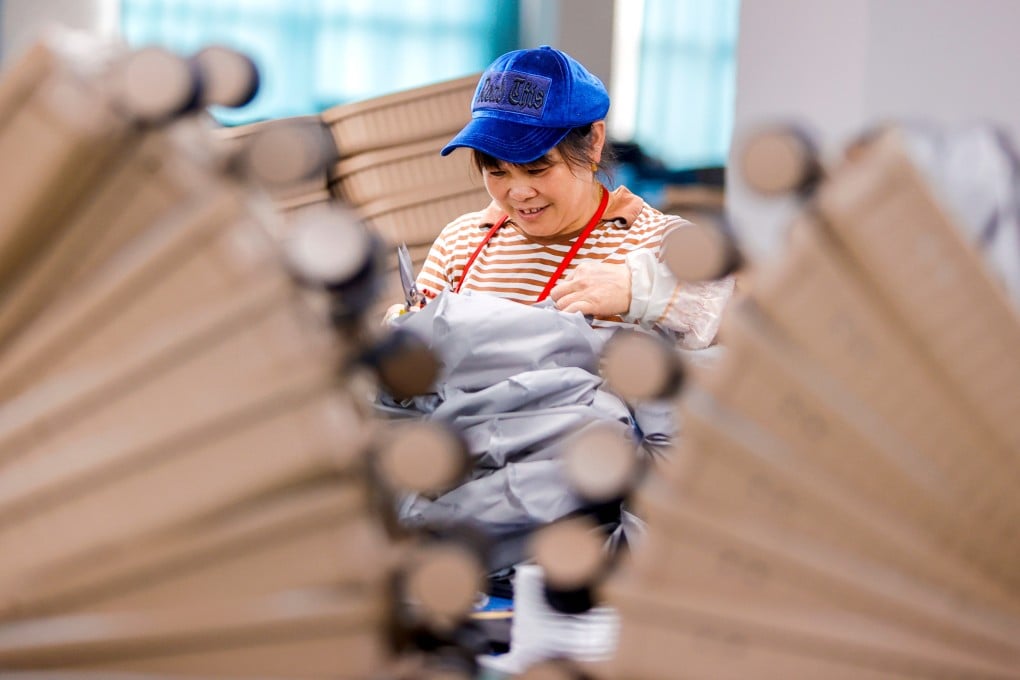A worker at a suitcase factory in Jian, central China's Jiangxi province. Photo: Getty Images