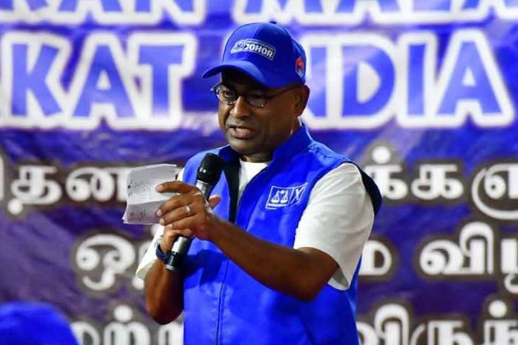 Abdul Azeez Abdul Rahim speaks at a Barisan Nasional rally in July. Photo: Facebook/AzeezRahim