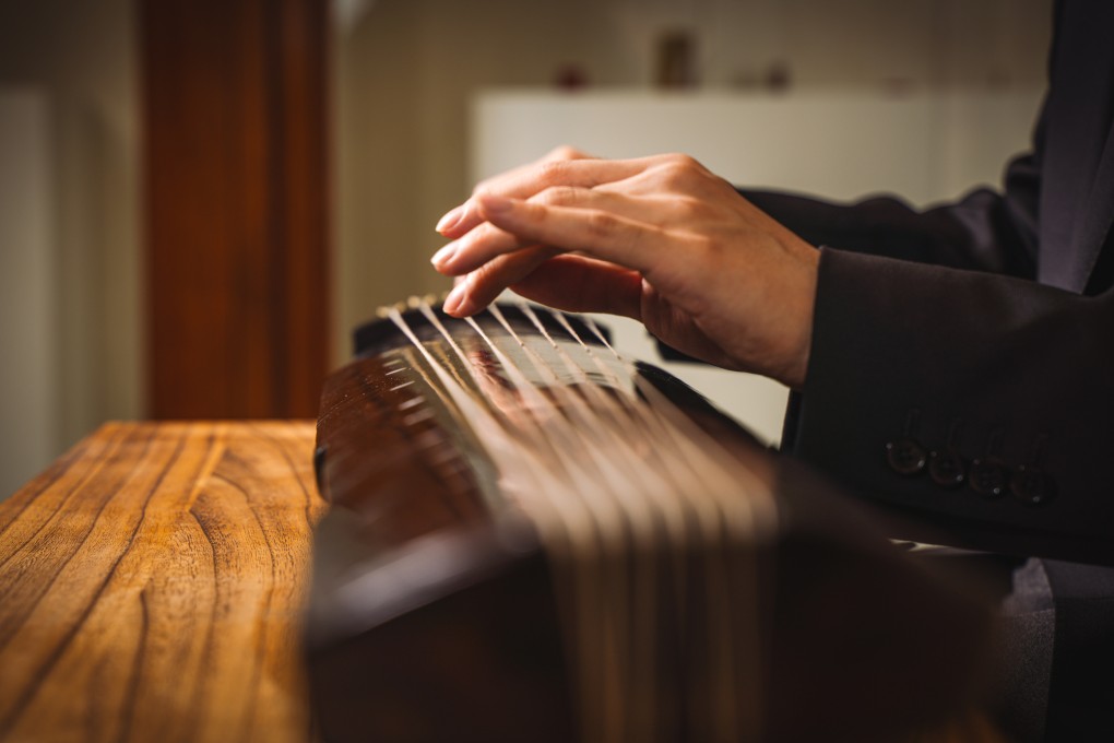 John Yiu, an art historian and the deputy director of the Jao Tsung-I Petite Ecole academic research and cultural centre, at the University of Hong Kong, with his guqin. Photo: Alexander Mak