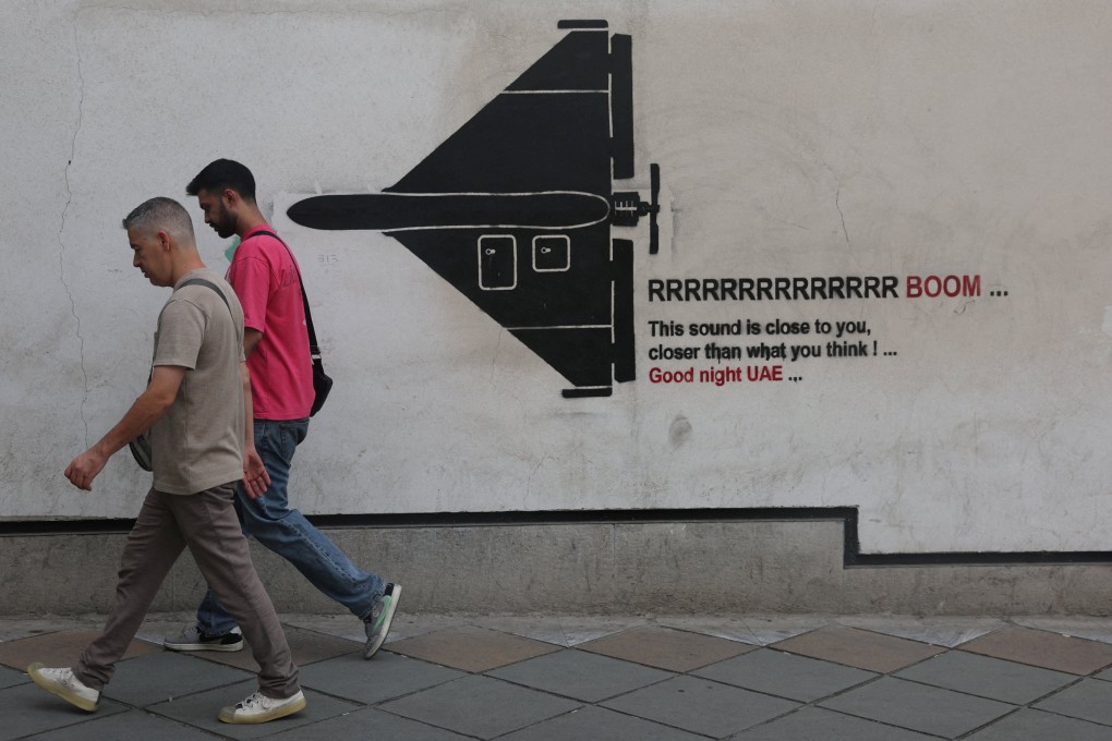A mural depicting an Iranian military drone in Tehran. Photo: WANA via Reuters