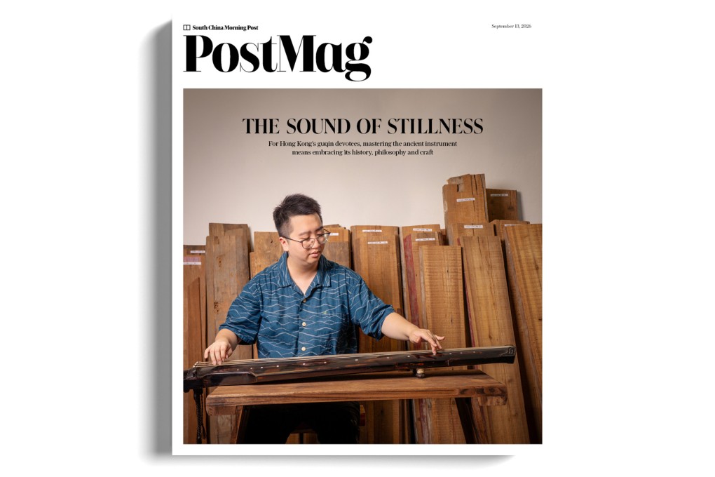 Guqin maker and player Jackel Wan with one of the instruments he crafted, at the Jockey Club Creative Arts Centre, in Shek Kip Mei, Hong Kong. Photo: Alexander Mak