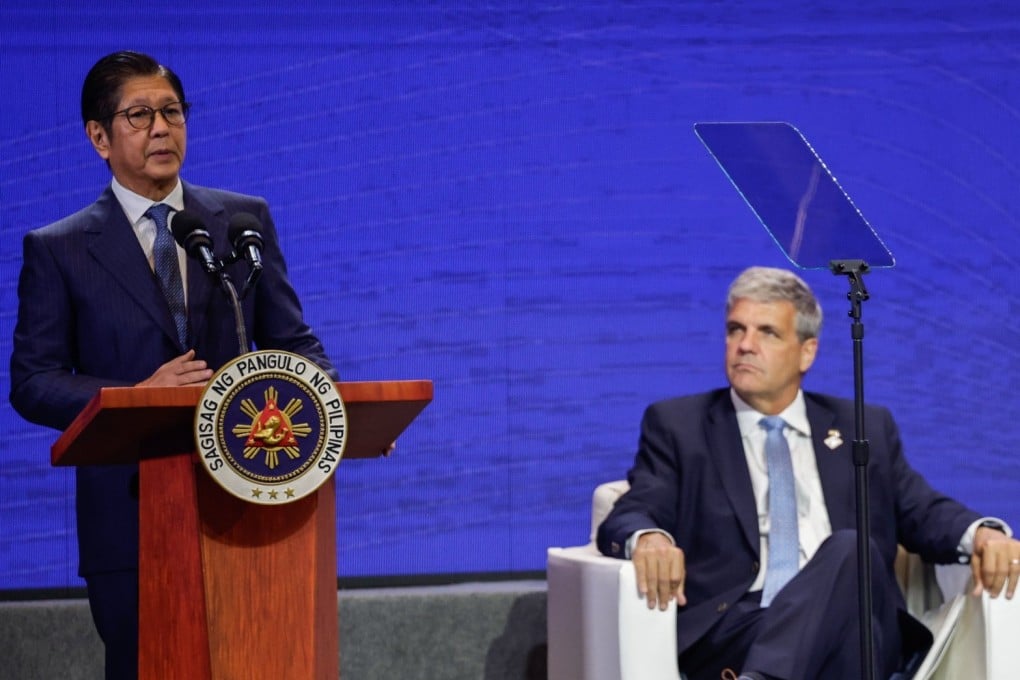 Philippine President Ferdinand Marcos Jnr (left) delivers a speech as US Trade and Development Agency Deputy Director Thomas Hardy looks on during the Luzon Economic Corridor Investment Forum in Taguig City on Thursday. Photo: EPA