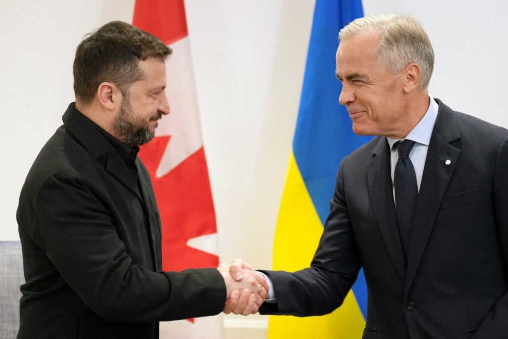 Canada’s Prime Minister Mark Carney (right) shakes hands with Ukraine’s President Volodymyr Zelenski during his visit to Calgary, Alberta, Canada, on Thursday. Photo: Reuters