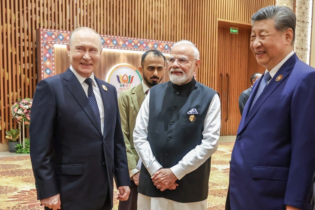 Russian President Vladimir Putin, Indian Prime Minister Narendra Modi, and Chinese President Xi Jinping meet at the Brics summit in New Delhi on Saturday. Photo: EPA/Indian Ministry of External Foreign Affairs