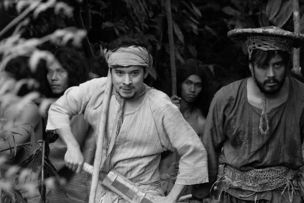Christian Bables (centre) in a still from Let Us Through, Dear Ancestors.