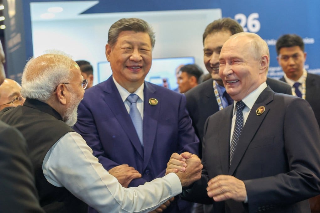 Indian Prime Minister Narendra Modi, Russian President Vladimir Putin and Chinese President Xi Jinping share a moment at Bharat Mandapam during the Brics summit in New Delhi, India, on Saturday. Photo: Handout via Reuters