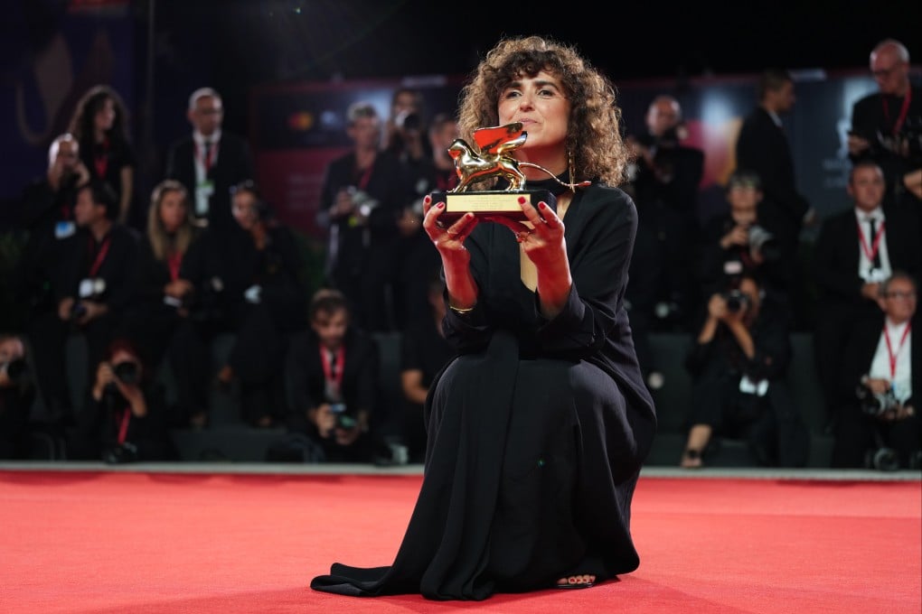 Director May el-Toukhy holds the Golden Lion she won for best film for “Woman Unknown” during the closing ceremony of the 83rd edition of the Venice Film Festival in Venice, Italy, on Saturday. Photo: Invision/AP