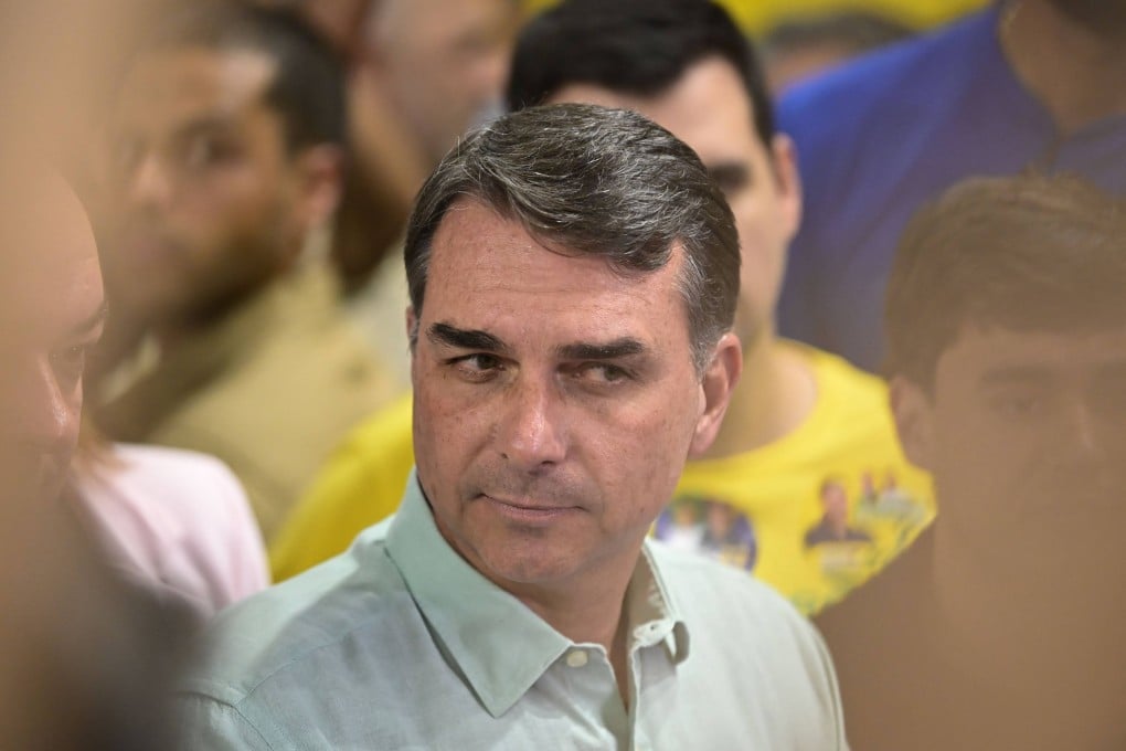 Senator and right-wing presidential candidate Flavio Bolsonaro is seen during a rally in Brazil on August 17. Photo: AFP