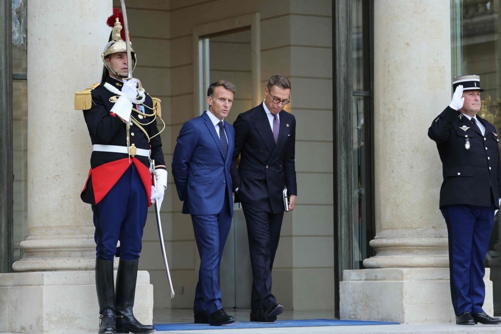 France’s President Emmanuel Macron (left) walks with Finland’s President Alexander Stubb after their meeting at the Elysee Palace in Paris on Thursday. Photo: AFP