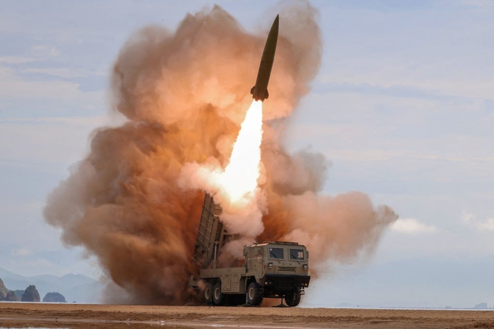A rocket launcher fires a missile during tests in North Korea on June 25. Photo: KCNA / Reuters