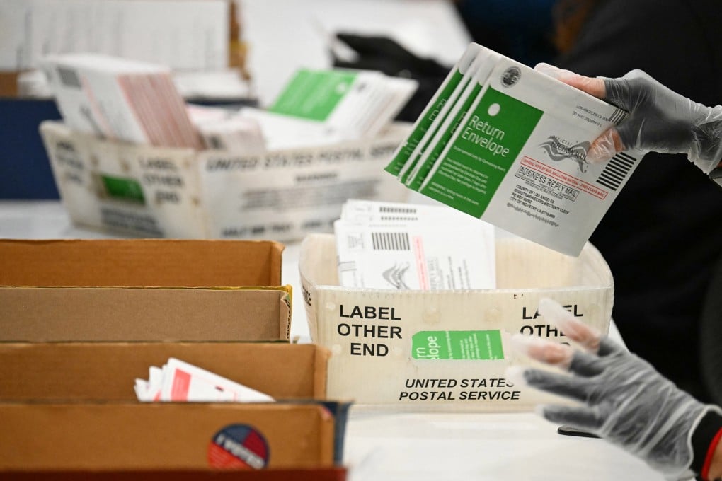 Election workers process mail-in ballots at the Los Angeles County Ballot Processing Centre during California’s state primary election in the City of Industry, California, on June 2. Trump has for years called for restrictions on voting by mail. Photo: TNS