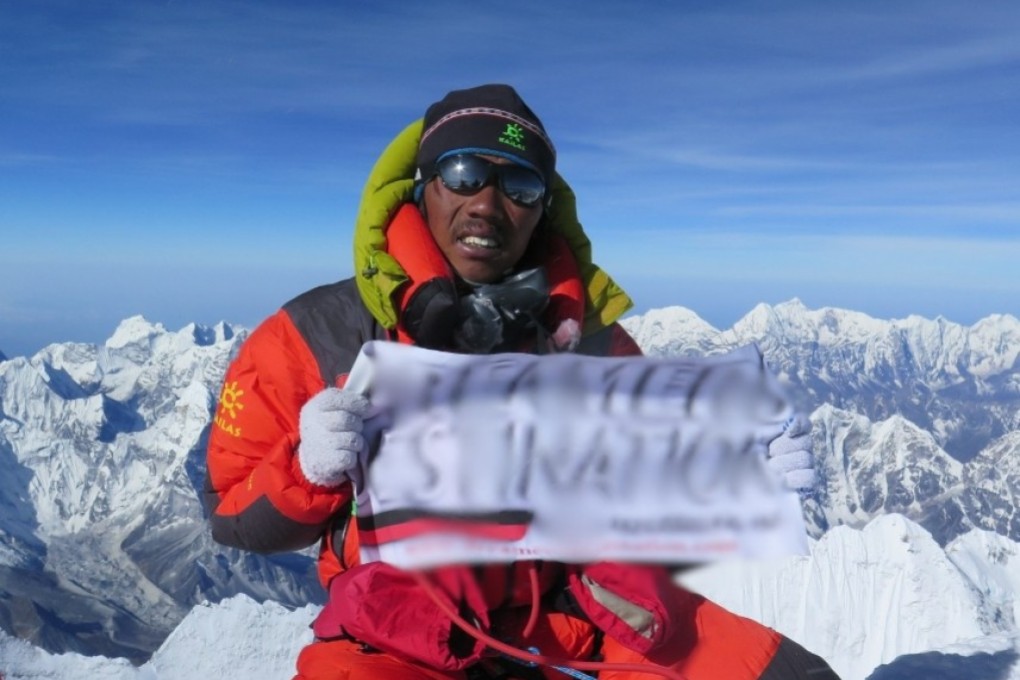 Phurba Tenjing Sherpa on the top of Mount Everest following one of his many ascents. Photo: Handout