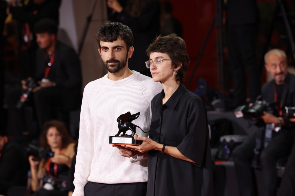 Israeli filmmakers Rachel Szor (right) and Yuval Abraham on the red carpet with their special jury prize for the documentary NAZA at the Venice International Film Festival in Venice, Italy on Saturday. Photo: EPA