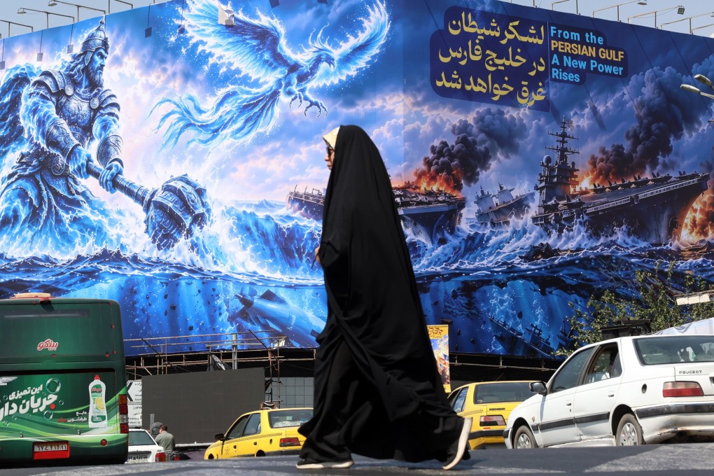 A propaganda billboard in Tehran depicting sinking US warships in the Persian Gulf. Photo: EPA