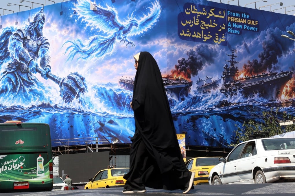A propaganda billboard in Tehran depicting sinking US warships in the Persian Gulf. Photo: EPA