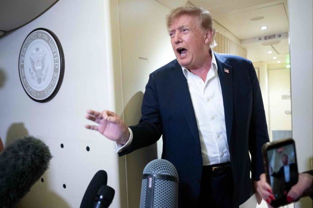 US President Donald Trump speaks to reporters aboard Air Force One while travelling back from Ireland to Maryland on Sunday. Trump has slammed concerns raised by US industry leaders about AI's potential dangers. Photo: AFP