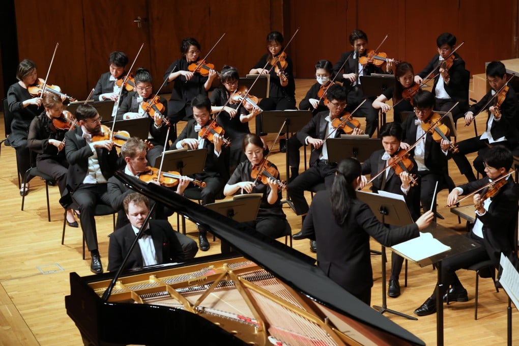 British pianist Benjamin Grosvenor plays as guest conductor Holly Hyun Choe (facing away) conducts the Hong Kong Sinfonietta during “Great Piano Concertos: Benjamin Grosvenor Plays Brahms”, at the Hong Kong City Hall Concert Hall on September 12, 2026. Photo: HKS