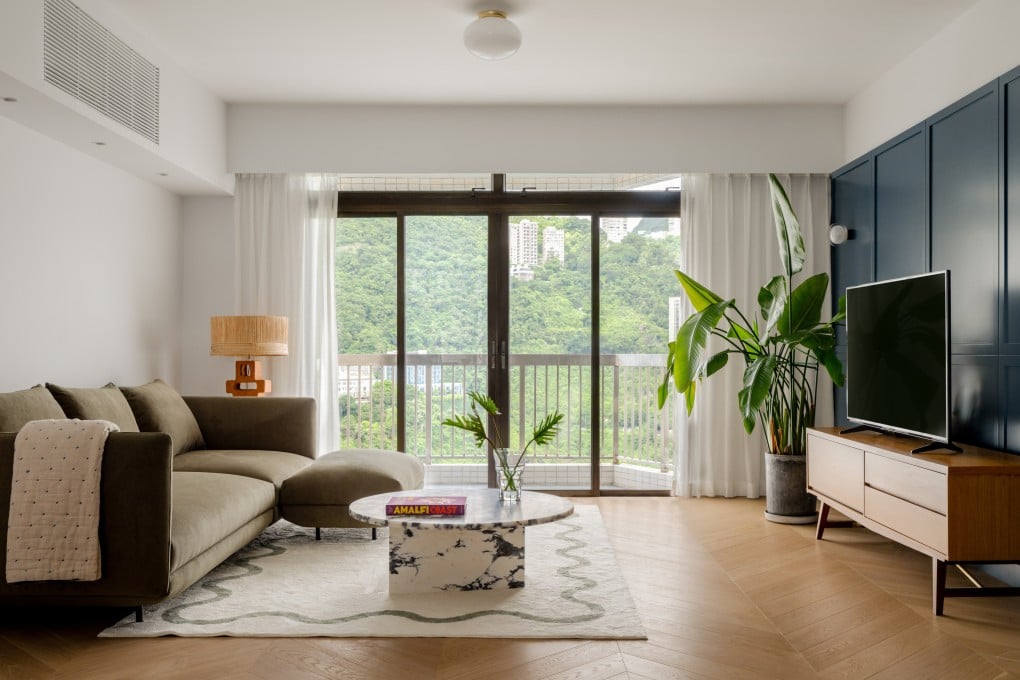 The living room of a flat in Happy Valley, Hong Kong, designed by Darius Woo of Kasawoo. The owners wanted a visually arresting yet profoundly calming home. Photo: Common Studio