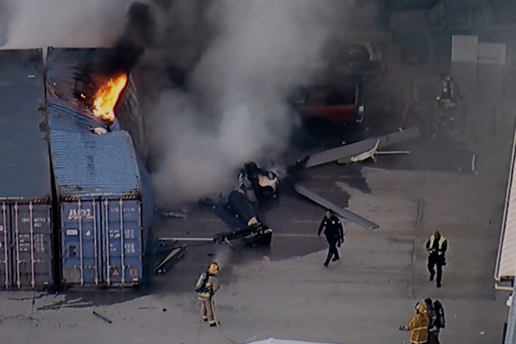 First responders at the scene of the helicopter crash. Photo: KABC-TV via AP