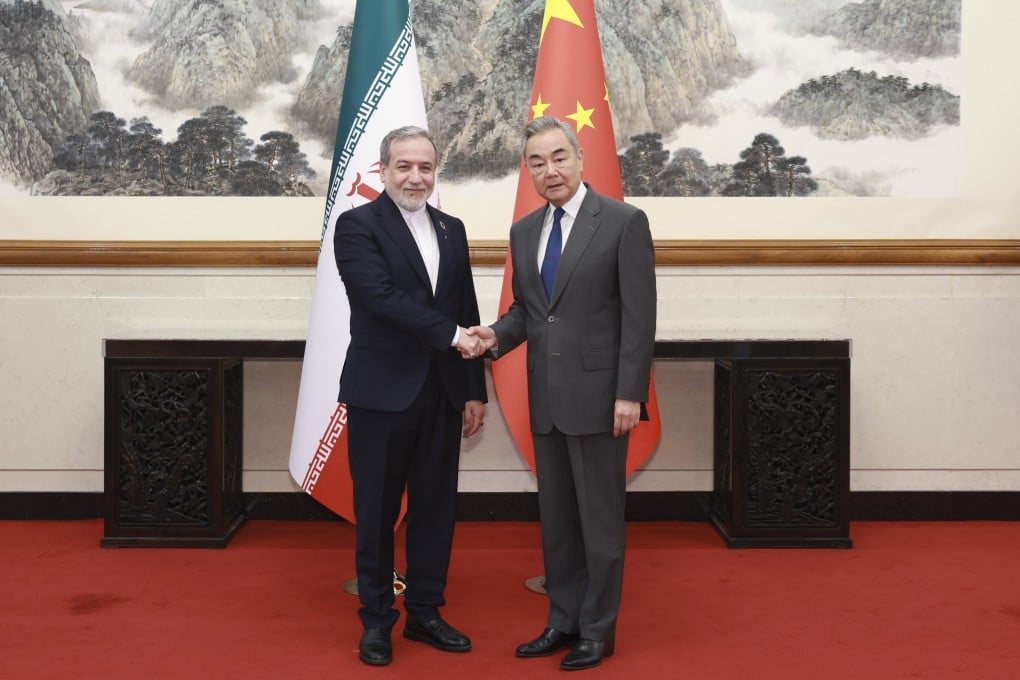 Chinese Minister of Foreign Affairs Wang Yi (right) urged all parties to take effective measures to reopen the Strait of Hormuz “at the earliest opportunity”. Photo: Xinhua