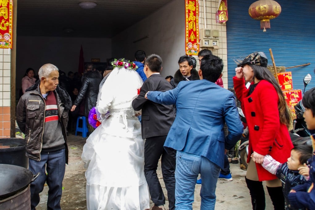 A wedding takes place in Kaizhou city, Chongqing, in 2014. As long as a preference for sons exists, daughters will continue to be seen as good for little more than marrying a man and bearing his children. Photo: Shutterstock