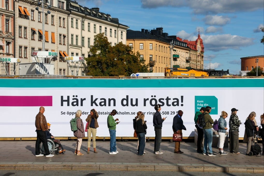 Citizens queue outside an early voting station ahead of the general election in Stockholm, Sweden on September 11. Photo: Reuters