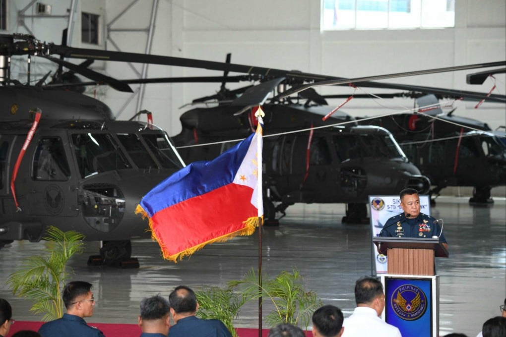 A Philippine Air Force officer speaking during the acceptance ceremony for the seven and last batch of S-70i Black Hawk helicopters at Villamor air force base in Manila in August. Photo: AFP