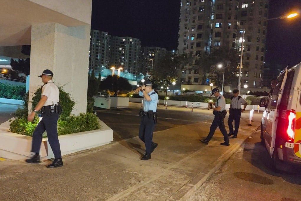 Police officers arrive at the Heng Fa Chuen private residential estate on Wednesday, where they found the 53-year-old woman dead. Photo: Handout