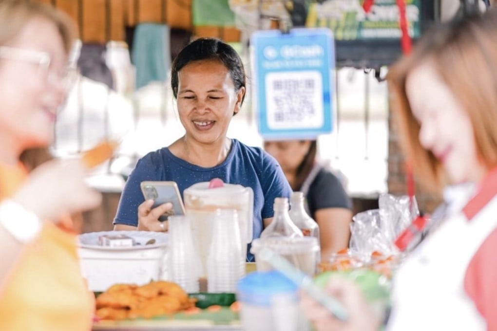 A woman use the GCash app in the Philippines. Digital payments accounted for around two-thirds of total retail transactions in the Philippines in 2025. Photo: Handout