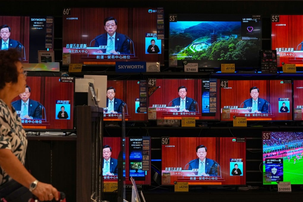 Television screens at a store in Quarry Bay show a live broadcast of Chief Executive John Lee delivering his fifth policy address and unveiling the city’s first five-year plan on September 16. Photo: Karma Lo