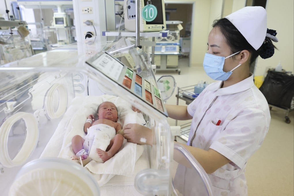A medical staff member cares for a newborn at the neonatology department of Lianyungang People’s Hospital in East China’s Jiangsu province. Photo: CFOTO/Future Publishing via Getty Images