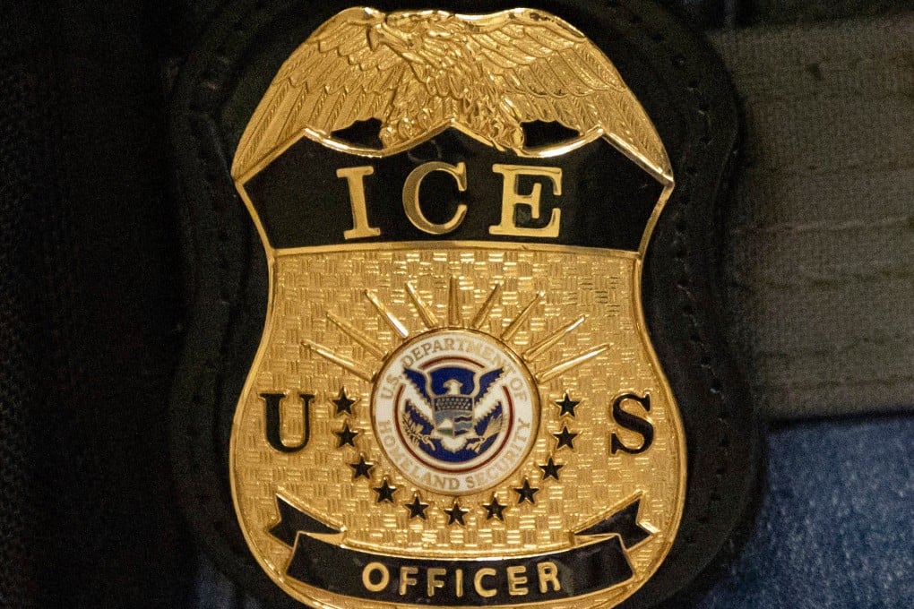 A federal agent wears an Immigration and Customs Enforcement badge in New York in June 2025. Photo: AP