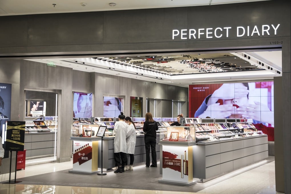 Customers browse cosmetics at a Perfect Diary store in Shanghai. Photo: Getty Images