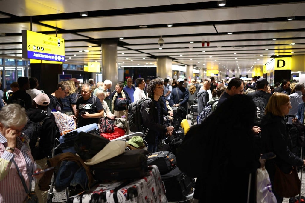 Delayed passengers wait at Terminal 3 of London’s Heathrow airport on September 8. Photo: AFP