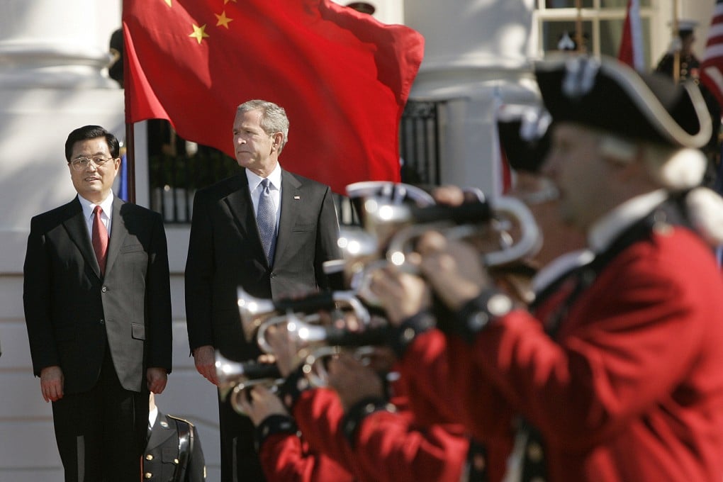 On April 20, 2006, Chinese and US leaders Hu Jintao and George W. Bush stand side by side during a ceremony on the South Lawn of the White House. Photo: AP