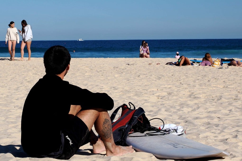People spend a sunny afternoon on Bondi Beach in Sydney on Friday. Photo: AFP