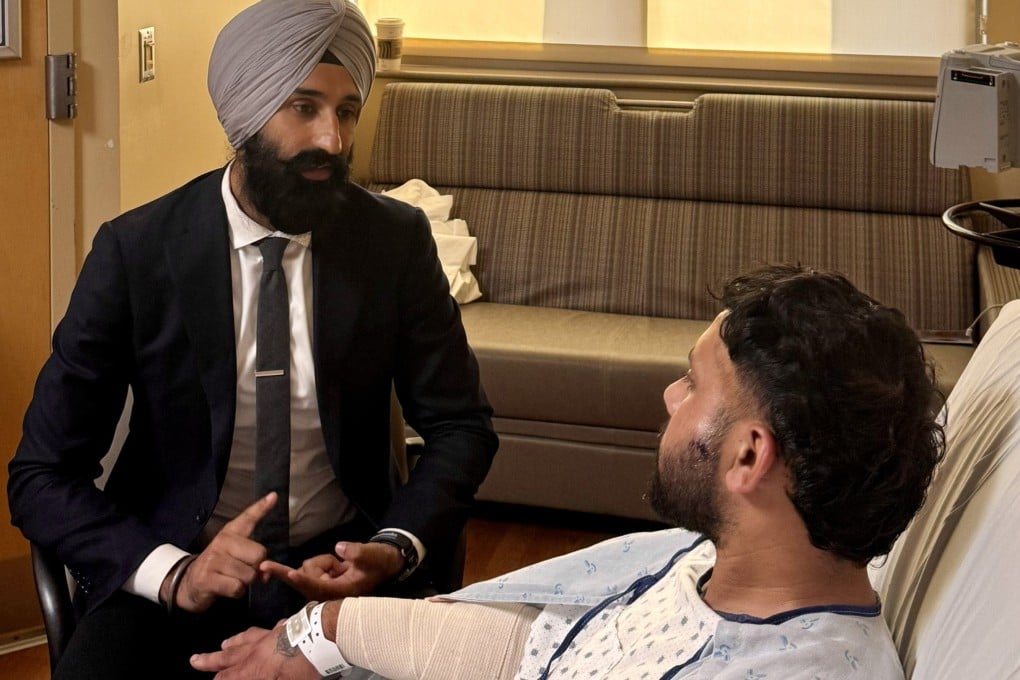 Jasjit Singh, Jakara Movement’s director of legal services, speaks with a Sacramento truck driver who was attacked in Wyoming on Sunday. Photo: Jakara Movement via TNS