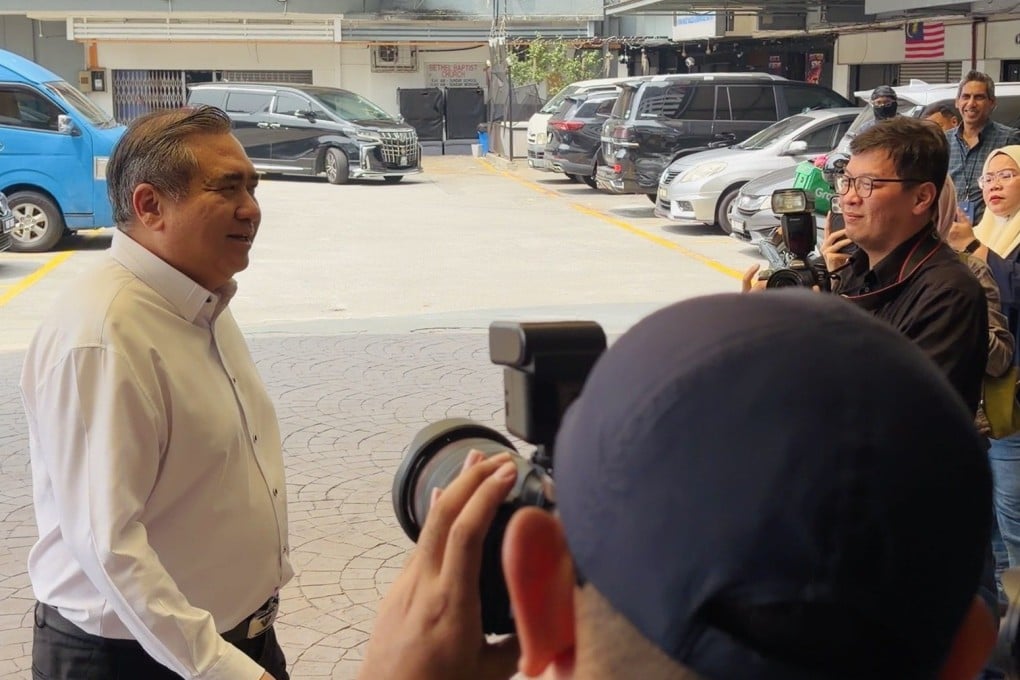 DAP secretary general Anthony Loke arrives at his party's headquarters on Saturday afternoon. Photo: Ushar Daniele